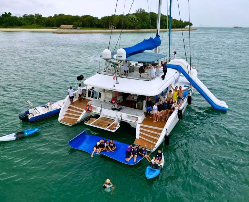 Ping-Lady-with-Slide Ping Lady_62ft catamaran for yacht rental in Singapore.