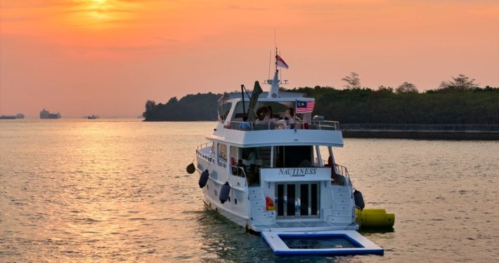 Sunset onboard the Nautiness; A 82ft motor yacht in Singapore